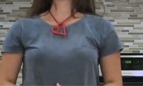 Close up of the finished heart pendant being worn by a person