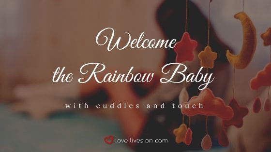 Welcome the rainbow baby with cuddles and touch