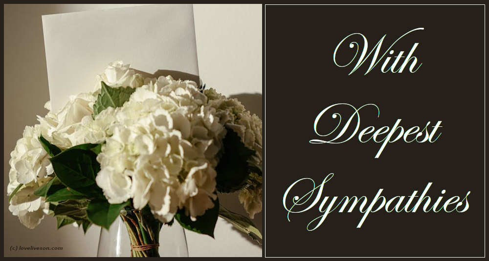 Decorative image of white flowers with a card with text overlay that says: "With deepest sympathies"