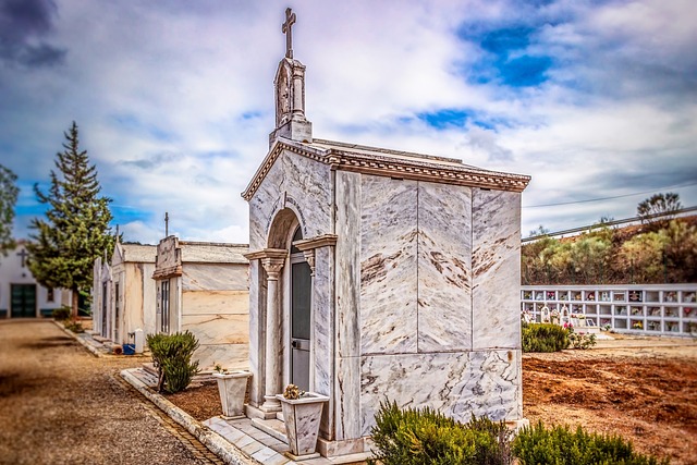 Small, individual mausoleums, three side-by-side